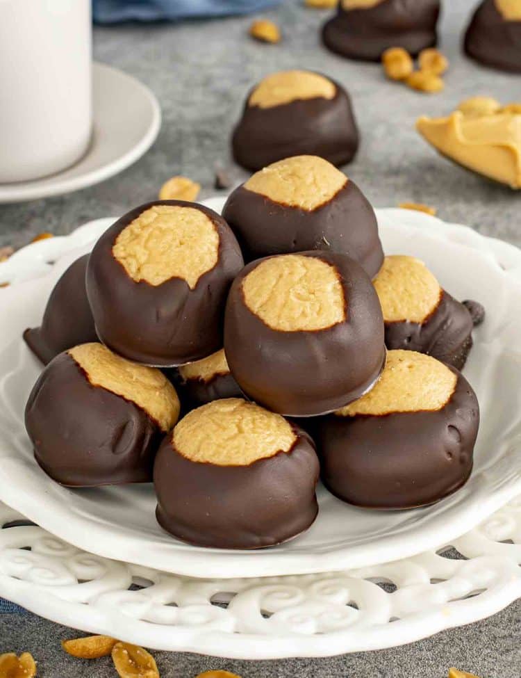 buckeye cookies on a white dessert plate.