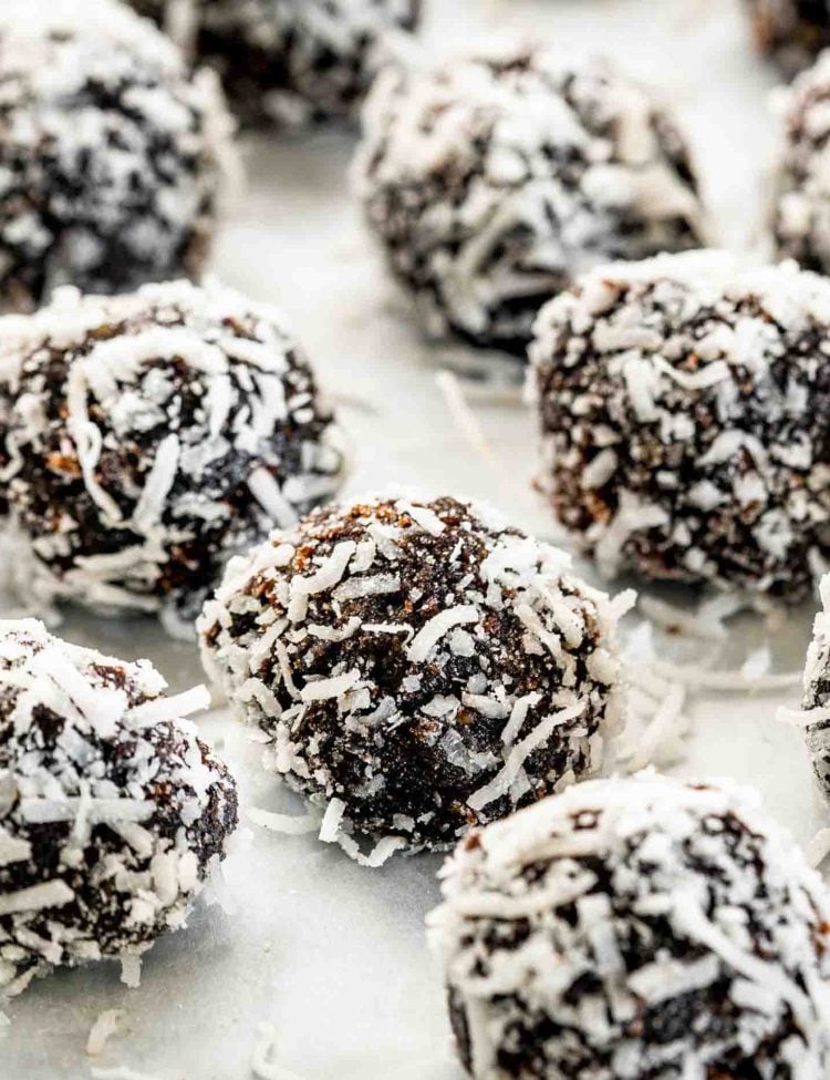 chocolate rumballs on a baking sheet lined with parchment paper.