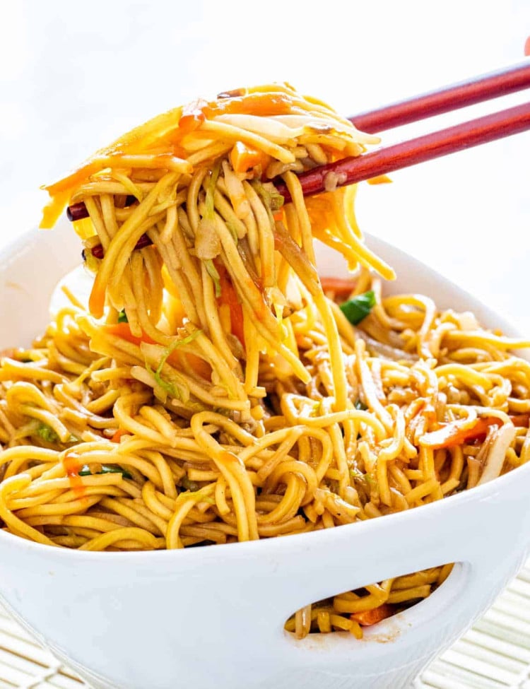 chow mein in a white asian bowl.