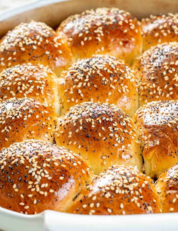 freshly baked dinner rolls in a baking dish.