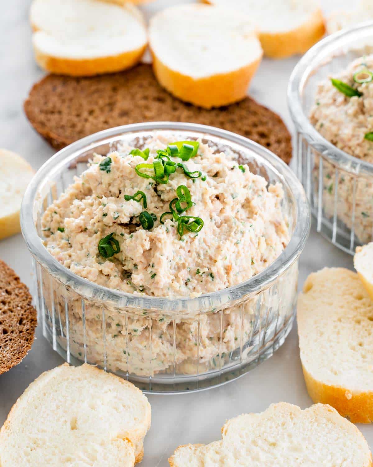 deviled ham in a jar with bread slices around