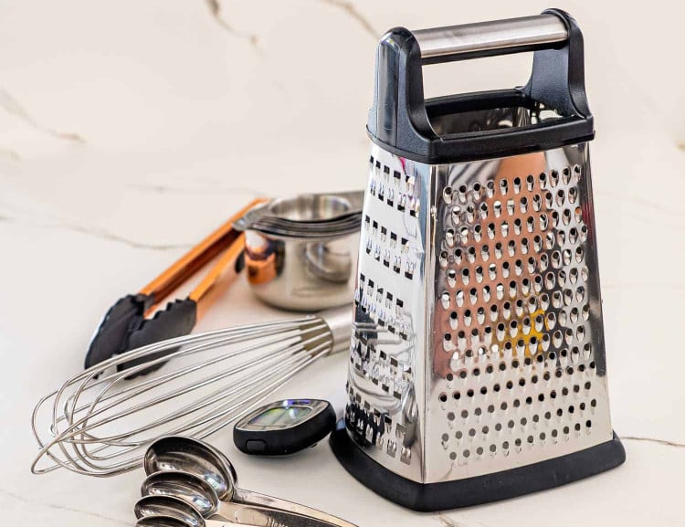 An assortment of kitchen tools displayed on a countertop