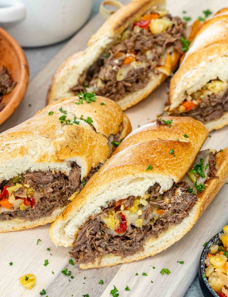 italian beef sandwich on a plate with giardiniera.