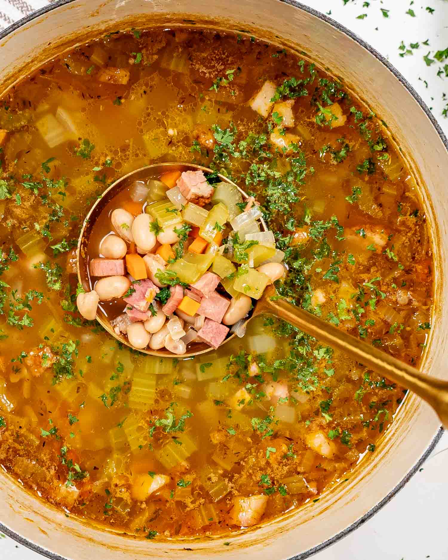 leftover ham and bean soup in a dutch oven.