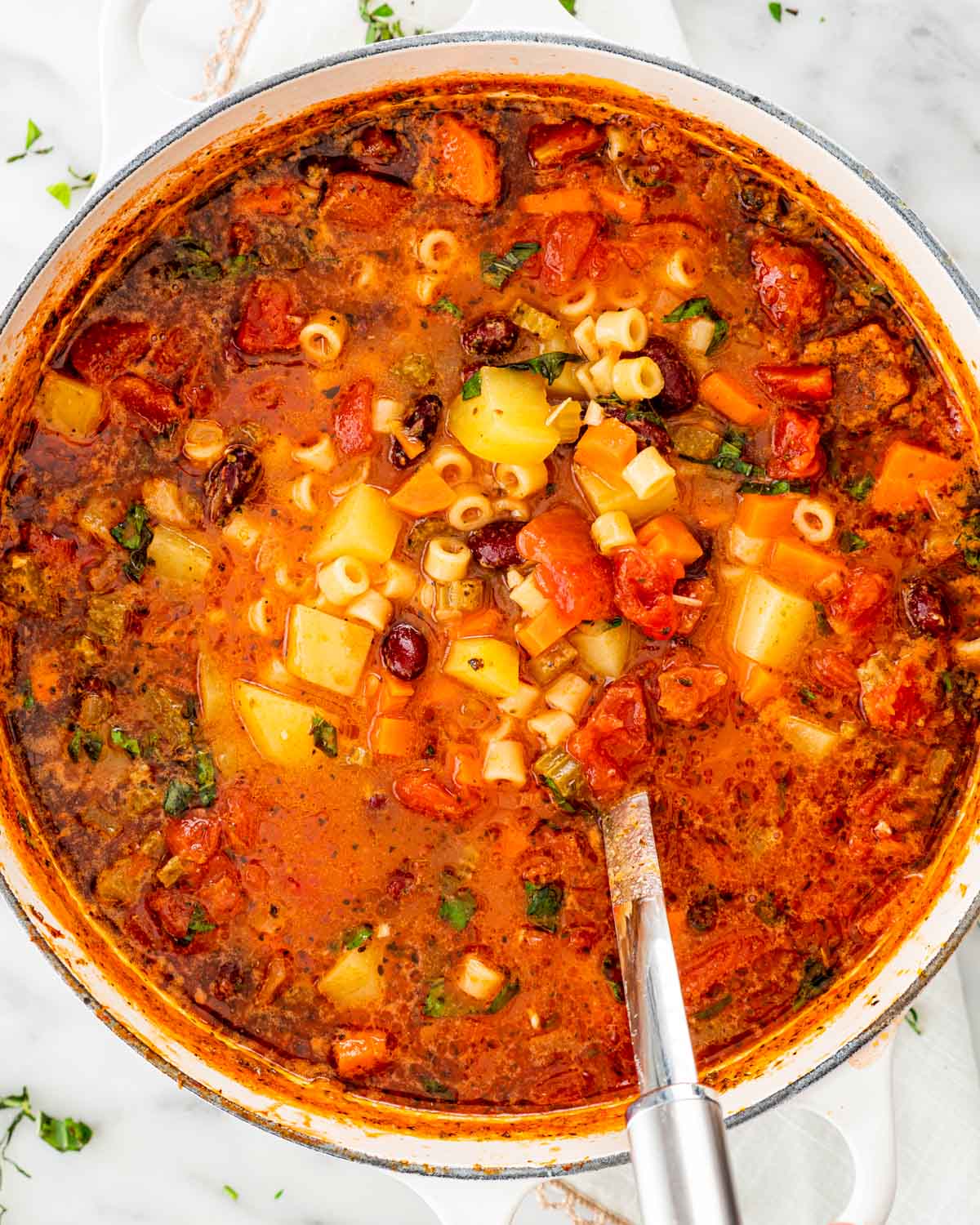 overhead shot of a pot filled with minestrone soup