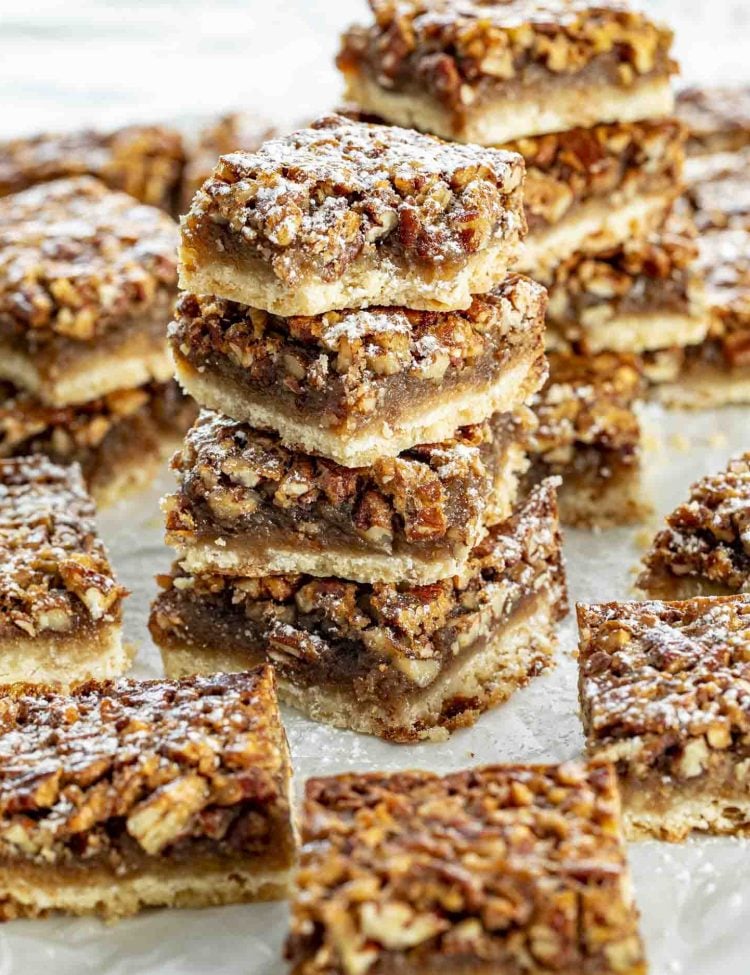 a stack of pecan pie bars.